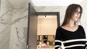 New secretary tall sexy horny brunette babe in glasses in the bathroom poses for many cameras
