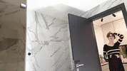 New secretary tall sexy horny brunette babe in glasses in the bathroom poses for many cameras