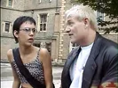 Geeky brunette seduces older stud to fuck her on the sofa