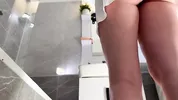 Sexy beauty cute blonde horny girl in pink panties and with a satin nightie does the bathroom routine before going to the bed