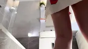 Sexy beauty cute blonde horny girl in pink panties and with a satin nightie does the bathroom routine before going to the bed