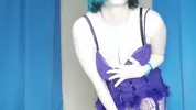 Blue-haired girl plays with her pussy and ass on a blue ottoman