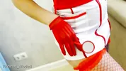 A fitness model in the role of a sexy nurse