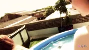 Lesbian babes are fucking on the rooftop by the pool
