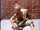 Blonde whore with big fake boobs has pussy pumped in the prison cell