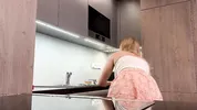 Big boobs blonde hot college girl in a mini skirt do house chores and flashes her legs and ass