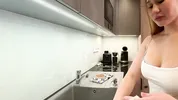 Big boobs blonde hot college girl in a mini skirt do house chores and flashes her legs and ass