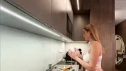 Big boobs blonde hot college girl in a mini skirt do house chores and flashes her legs and ass