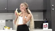 Hot tattooed blonde long hair beauty in the kitchen takes her panties off to show her meaty pussy an