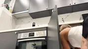 Hot tattooed blonde long hair beauty in the kitchen takes her panties off to show her meaty pussy an