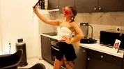 Hot tattooed blonde long hair beauty in the kitchen takes her panties off to show her meaty pussy an
