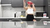 Hot tattooed blonde long hair beauty in the kitchen takes her panties off to show her meaty pussy an