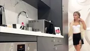 Hot tattooed blonde long hair beauty in the kitchen takes her panties off to show her meaty pussy an