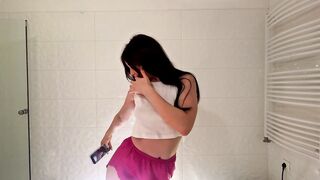 Amazingly beautiful college girl prepares for a night out with a short cut mini skirt to flash pussy