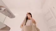 Amazingly beautiful college girl prepares for a night out with a short cut mini skirt to flash pussy
