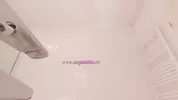 Amazingly beautiful college girl prepares for a night out with a short cut mini skirt to flash pussy