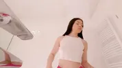 Amazingly beautiful college girl prepares for a night out with a short cut mini skirt to flash pussy