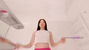 Amazingly beautiful college girl prepares for a night out with a short cut mini skirt to flash pussy