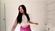 Amazingly beautiful college girl prepares for a night out with a short cut mini skirt to flash pussy