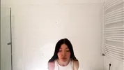 Amazingly beautiful college girl prepares for a night out with a short cut mini skirt to flash pussy