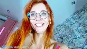 Skinny redhead managed to fit 4 dildos inside herself