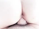 There are a pair of slender white silk legs inserted into the moist white tiger hole, white silk legs and moist vagina
